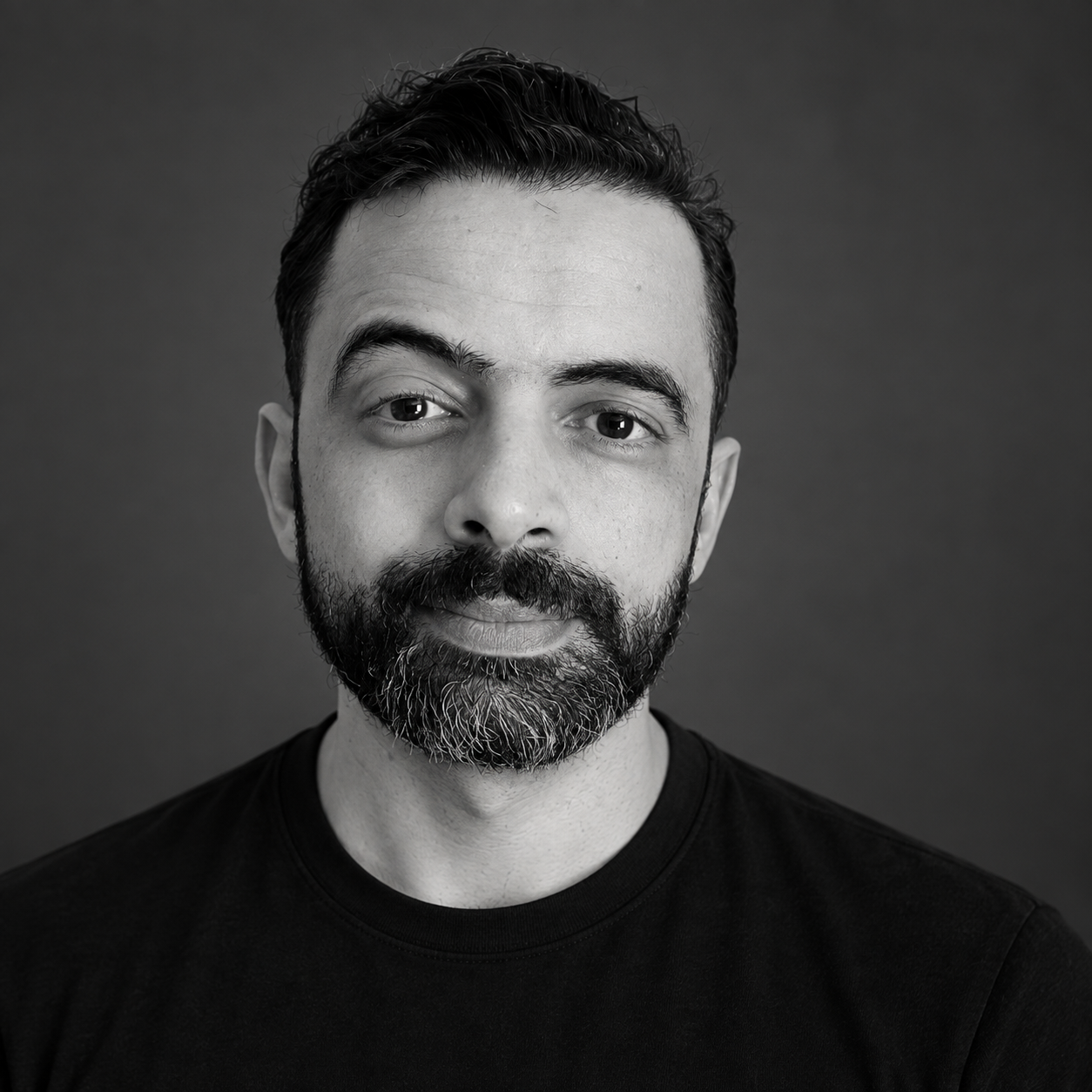 Black and white portrait of Mouhsine Adnani